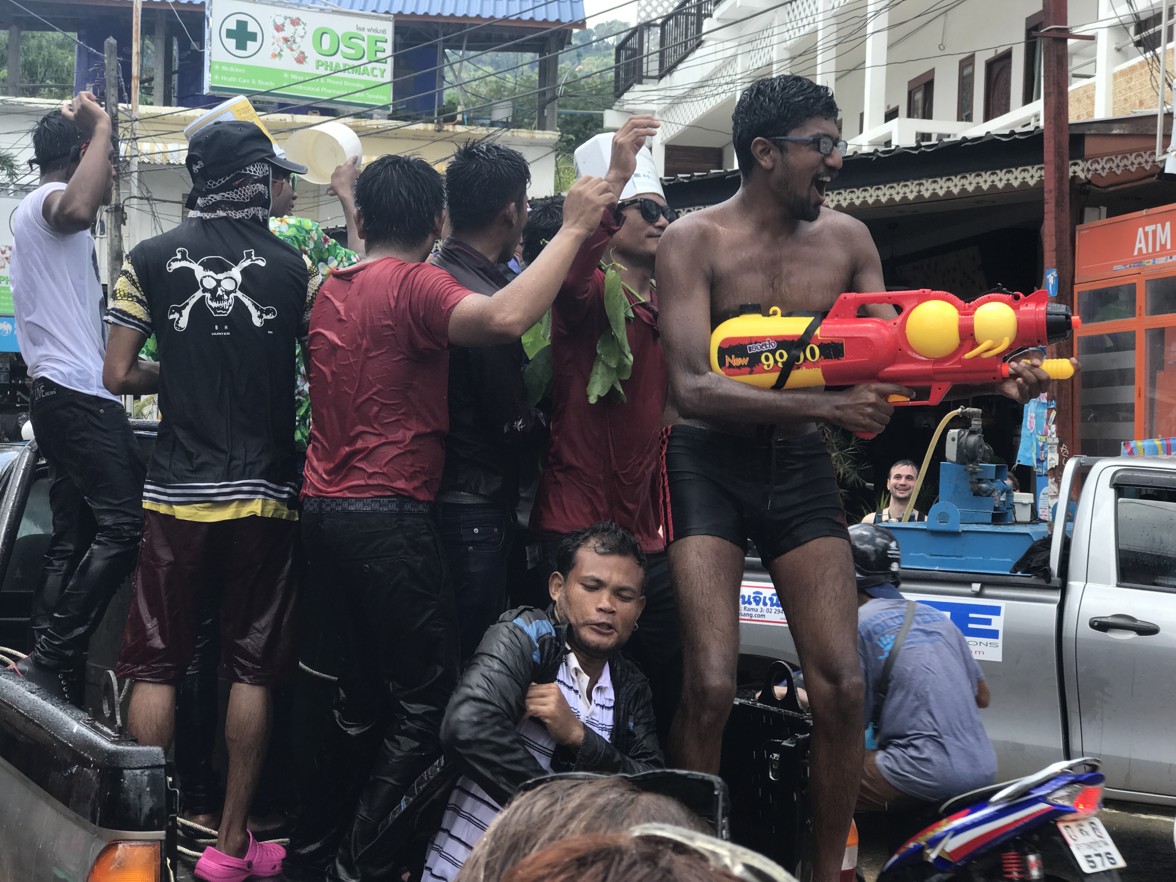 Firing water on people from an open jeep in Koh Tao celebrating Songkaran