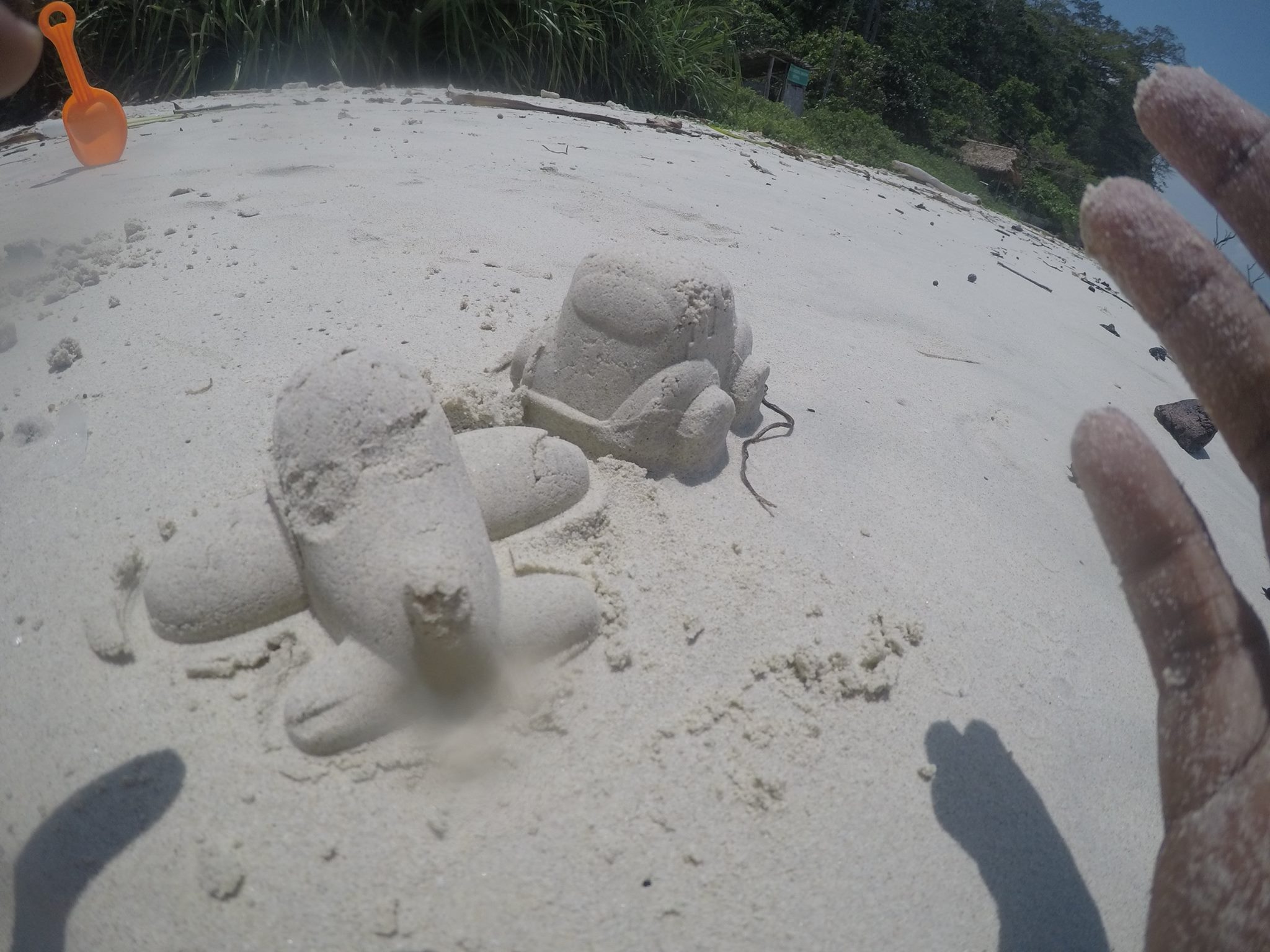 Motion on the Beach-Sand art for an airplane and car-Kalapathar Beach in Havelock Island-India